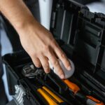 Electrician working on electrical wiring system in the USA