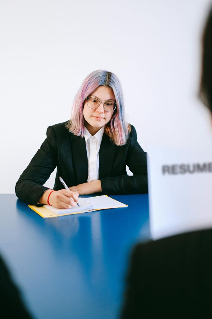 Job candidate confidently attending job interview and answering questions professionally