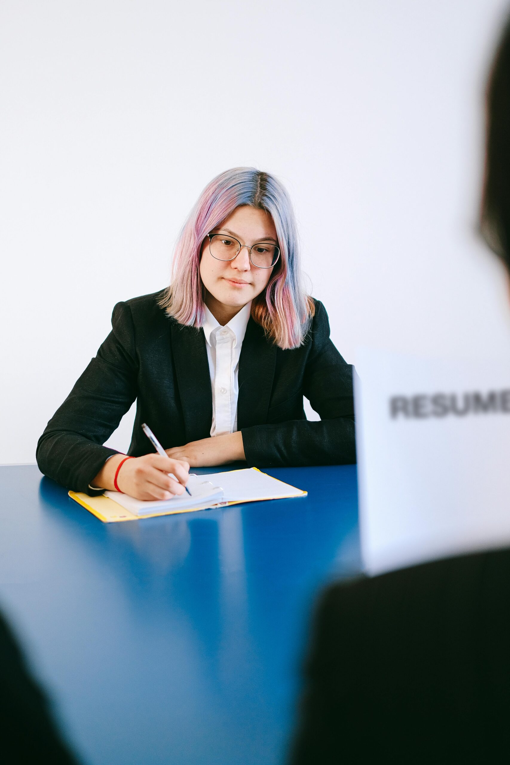 Job candidate confidently attending job interview and answering questions professionally