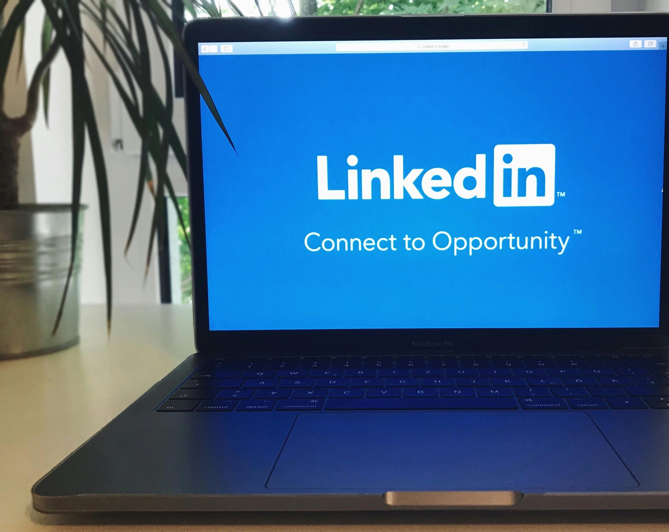 Professional LinkedIn profile optimization on laptop for better job opportunities and recruiter visibility