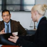 Job candidate demonstrating confident body language during professional interview meeting