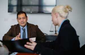 Job candidate demonstrating confident body language during professional interview meeting