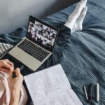 Freelancer learning high-demand online skills from home using laptop and digital tools
