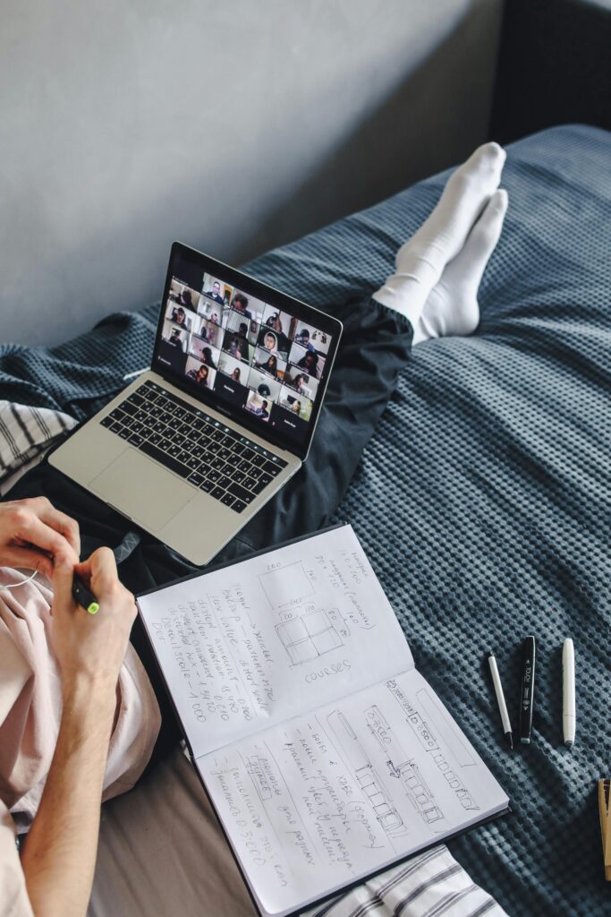 Freelancer learning high-demand online skills from home using laptop and digital tools