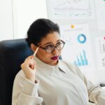 Professional reflecting on career growth while planning future learning and development goals