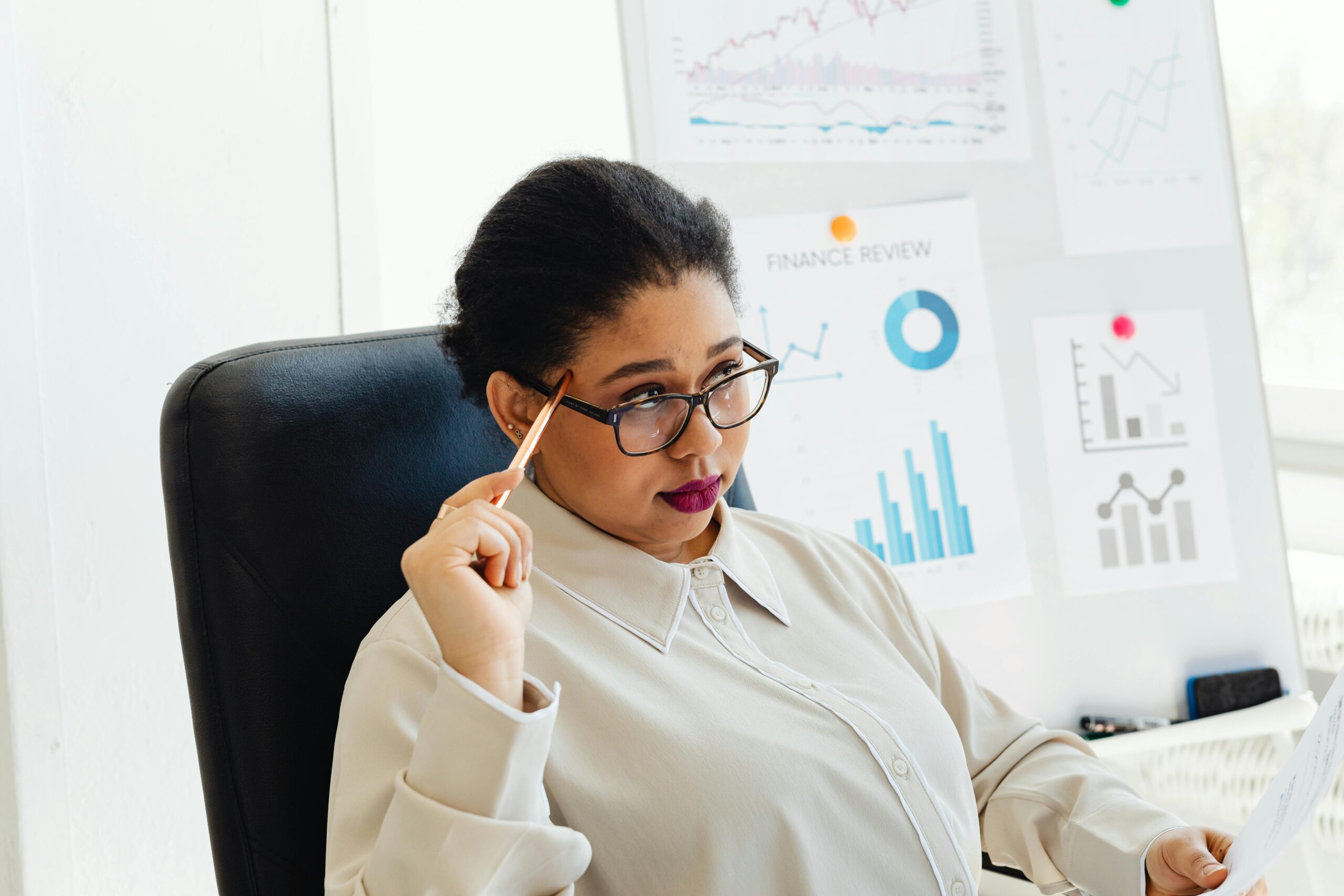 Professional reflecting on career growth while planning future learning and development goals
