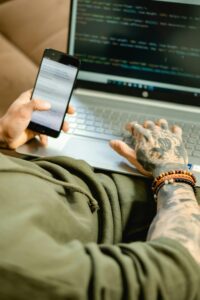 Beginner preparing for technical interview while practicing coding and problem-solving on laptop