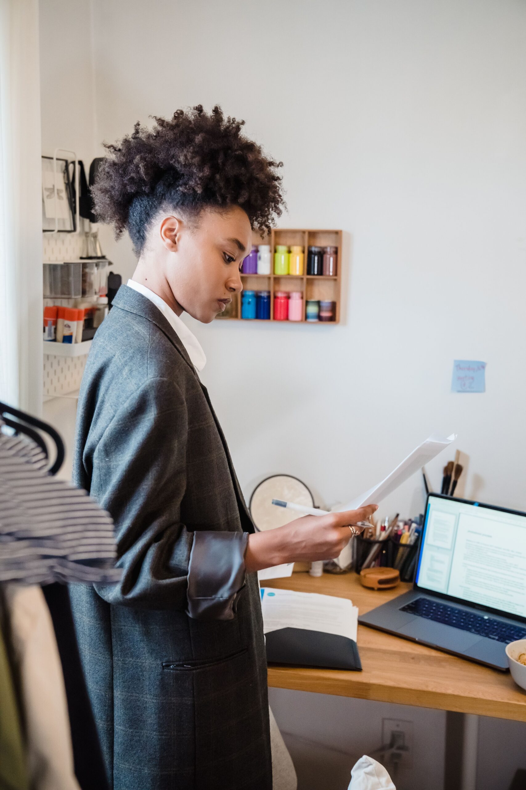 Job seeker staying productive while applying for jobs and improving skills on laptop at home